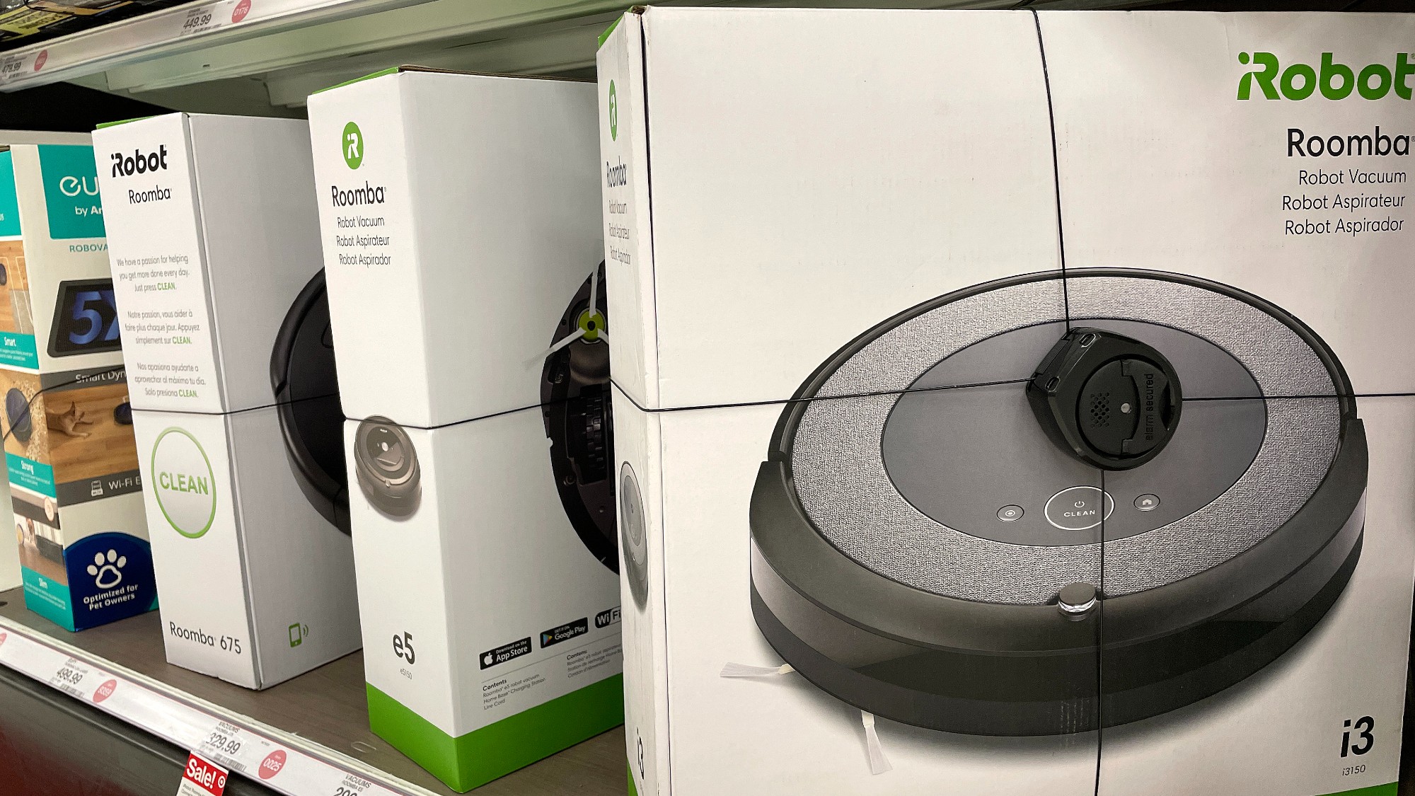 Robot vacuums on a shelf at a store