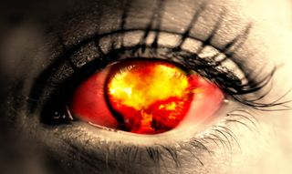 A nuclear explosion reflected in an eye.