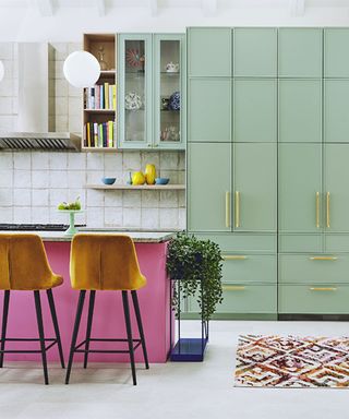 Modern kitchen ideas with pink painted island and green units