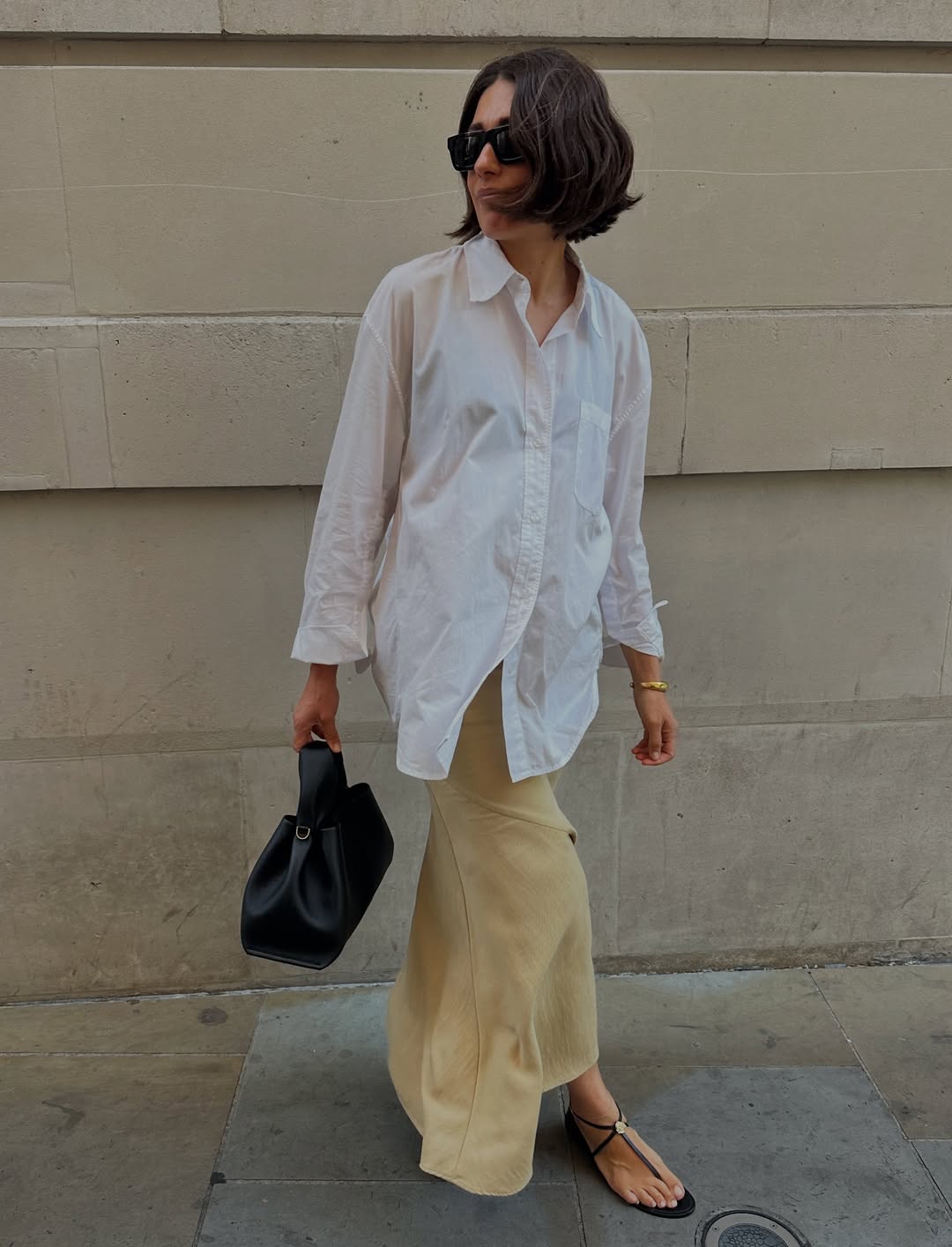 @lucyalston_ wears linen shirt, linen shirt and sandals