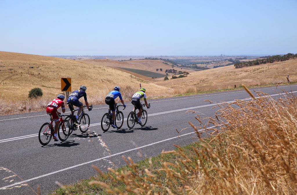 The four-man breakaway out on the course