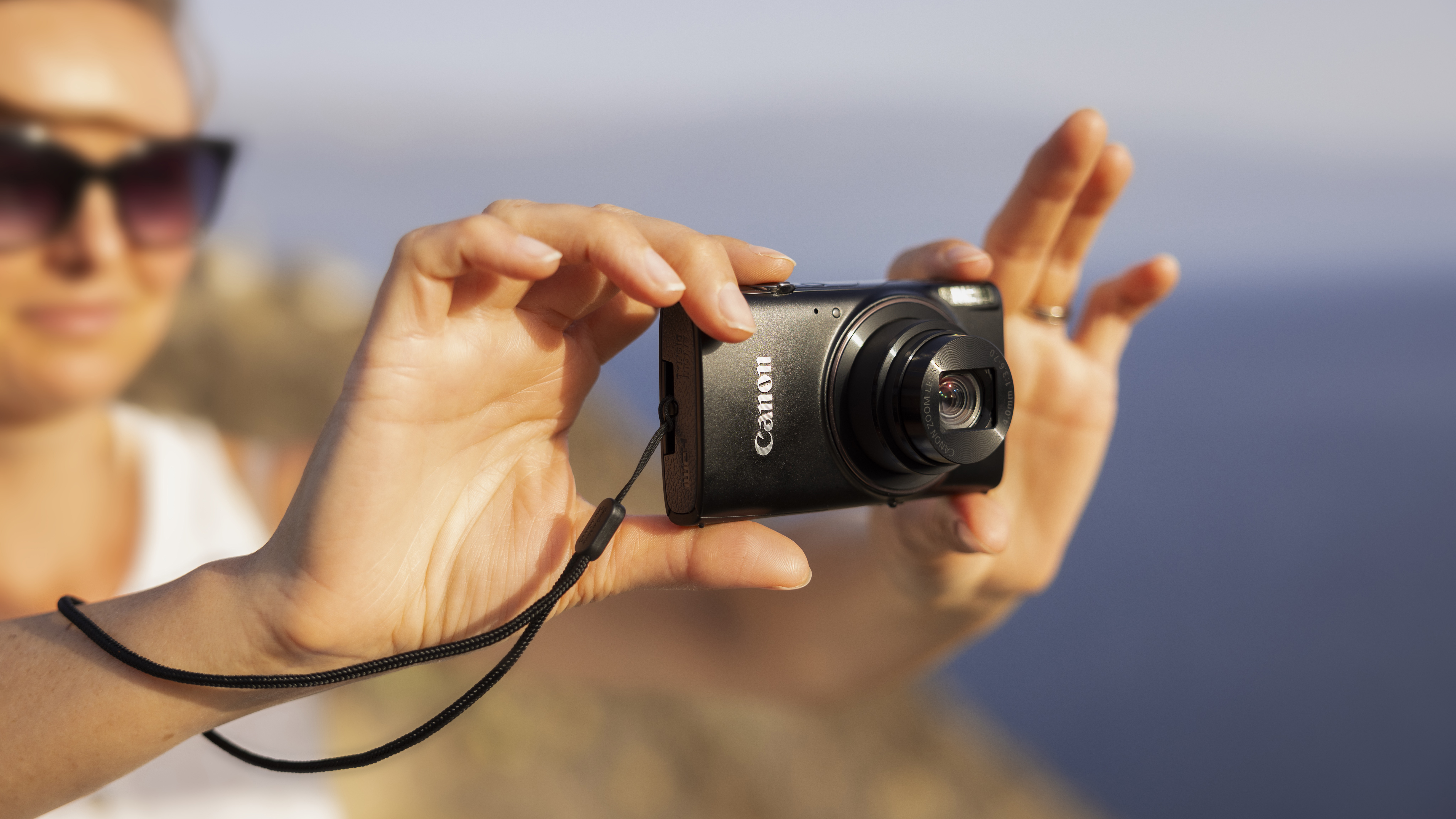 Canon PowerShot Elph 360 / Ixus 285 HS A being used outdoors