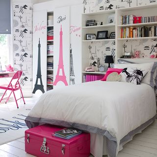 kids room with Paris themed wallpaper and wall stickers