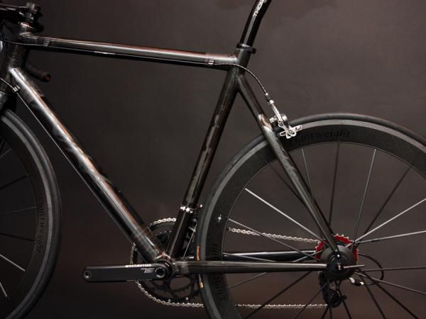 Clean lines and modestly sized tubes are featured on this KirkLee carbon road frame.
