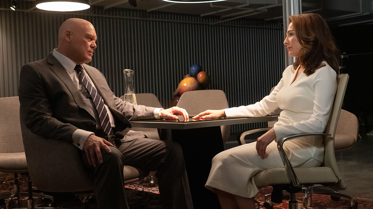 Wilson Fisk and Vanessa Fisk look at each other while they are sitting in Daredevil: Born Again Season 1