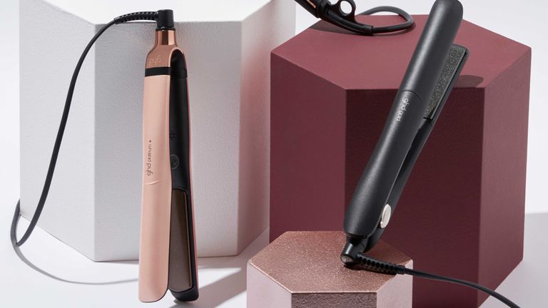 GHD Platinum Plus: lifestyle image of pink and black GHD straighteners