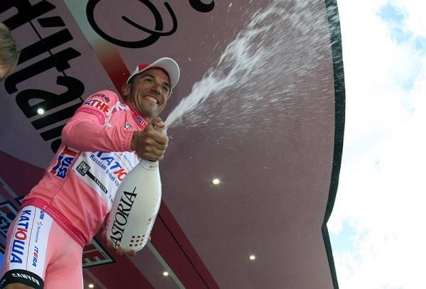 Giro leader Joaquim Rodriguez celebrates with some champagne.