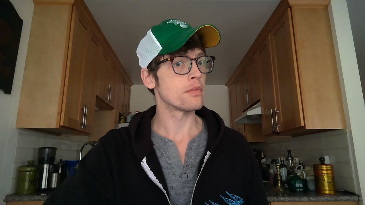 Dell XPS 16 vs MacBook Pro 16-inch webcam test photos