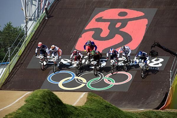History in the making: BMXers bolted down the start ramp adorned with the Olympic Games rings.