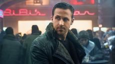 Ryan Gosling looks to the side in Blade Runner 2049