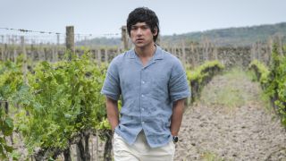 Ethan walking through vineyard in The White Lotus