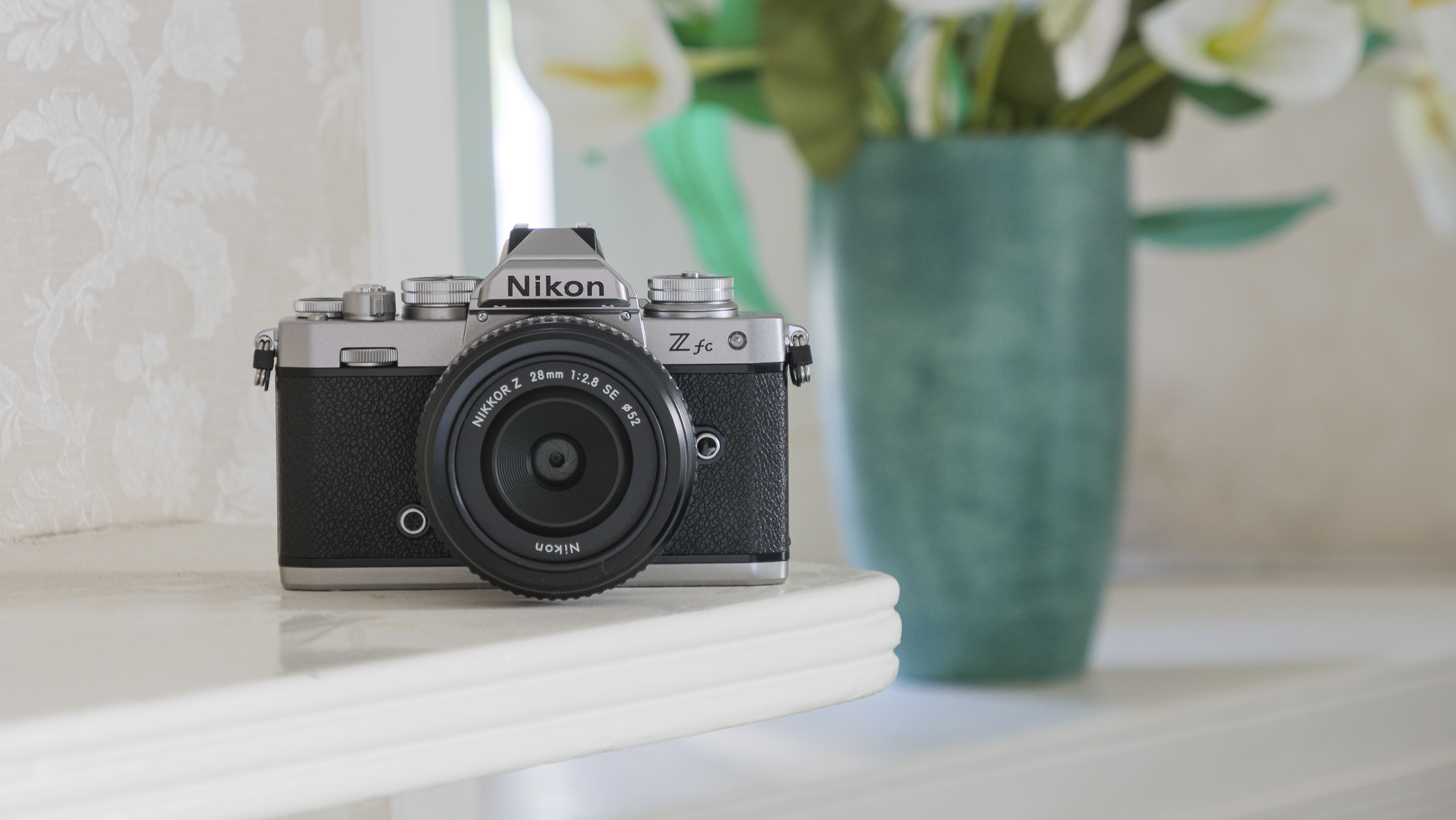 The Nikon Z fc camera on a shelf