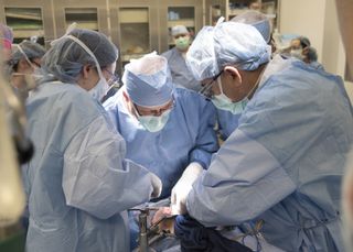 Surgeons at the Cleveland Clinic work on the first uterus transplant in the U.S.