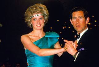 Diana wore the emerald choker around her head, pulling it off and creating a whole new look