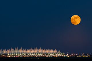 full moon over airport