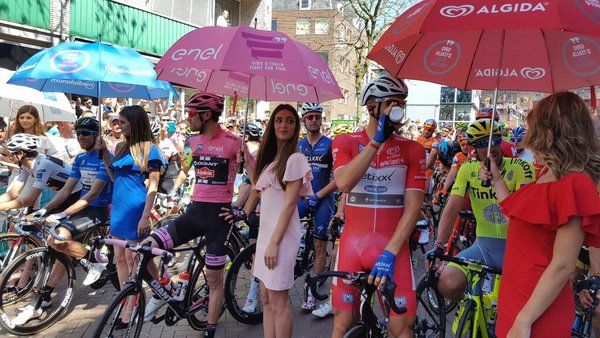 The riders await the start