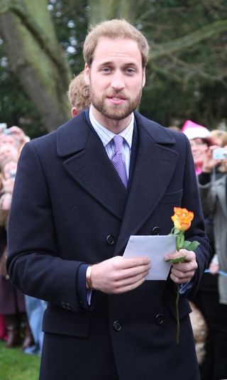 Suit, Formal wear, Tuxedo, Facial hair, Event, Beard, Ceremony, Smile, White-collar worker, Plant,