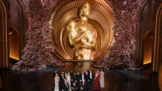 Producers of "Oppenheimer" British film producer Emma Thomas (C), US film producer Charles Roven (L) and British filmmaker Christopher Nolan accept the award for Best Picture onstage during the 96th Annual Academy Awards at the Dolby Theatre in Hollywood, California on March 10, 2024.