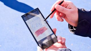 best 5g phones: Samsung Galaxy S23 Ultra using S Pen taking notes