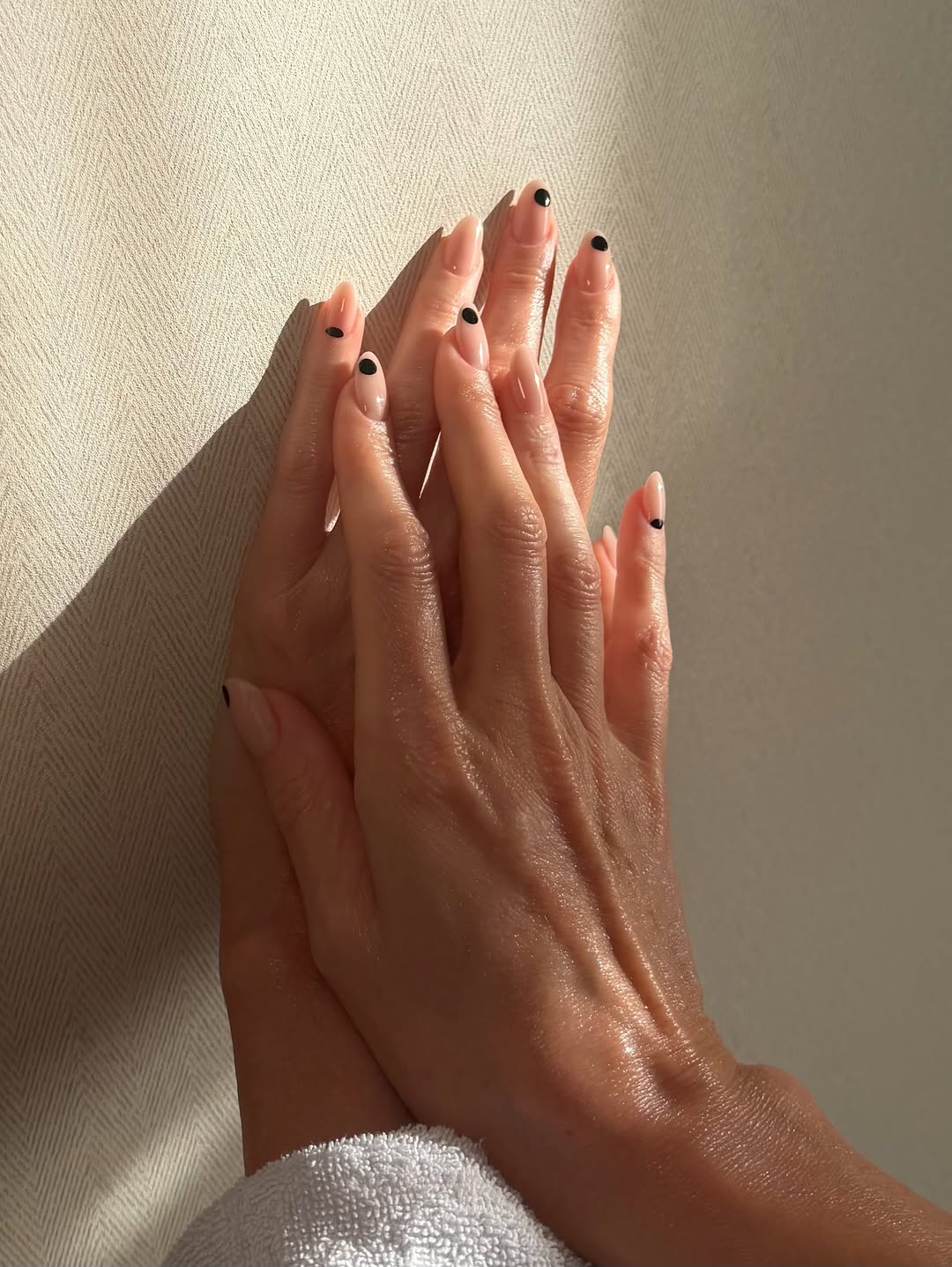 Charlize Theron minimal dot manicure