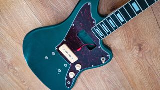 DIY guitar kit with pickguard fitted and one pickup