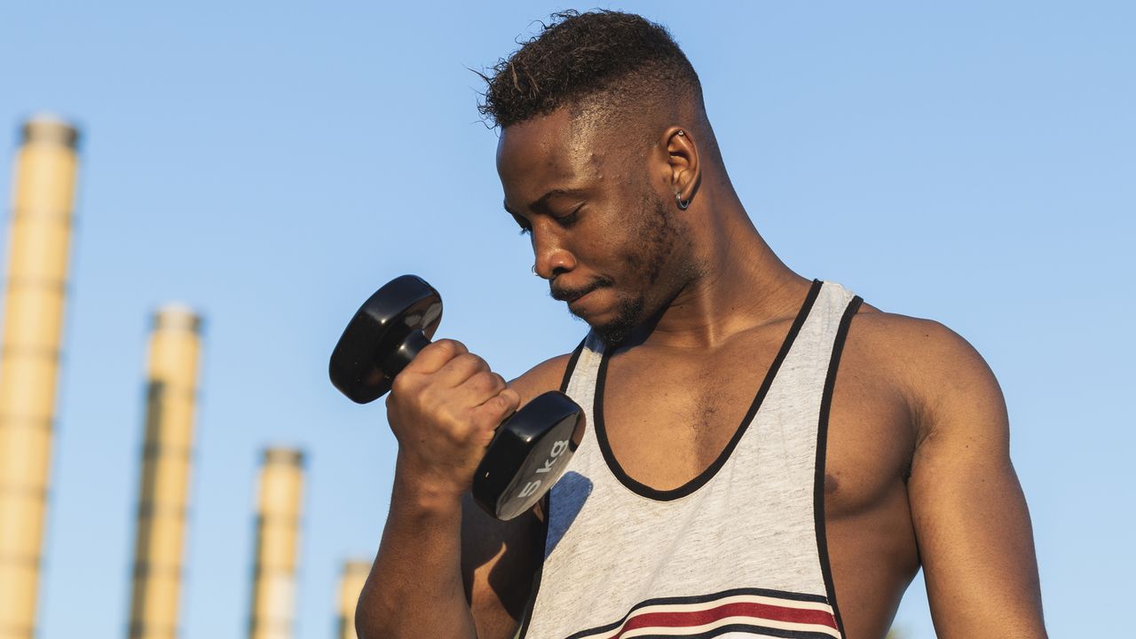 Man working out with dumbbells