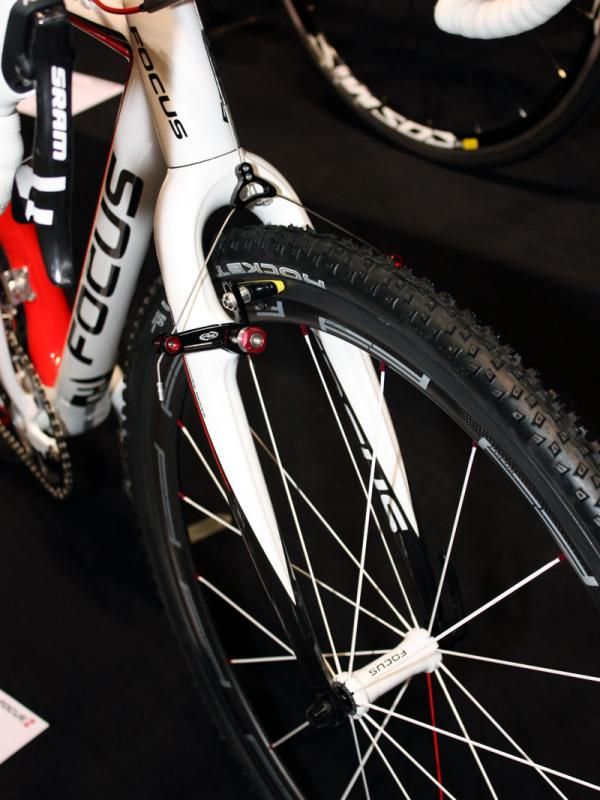 The front end of Focus's Mares CX 1.0 flagship includes mid-deep carbon clinchers, Schwalbe tires, Avid Shorty Ultimate brakes.