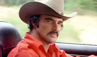 Smokey and The Bandit Burt Reynolds giving some side eye in the driver's seat