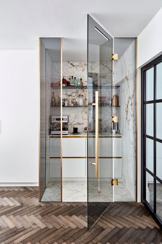 a coffee bar in a glass pantry