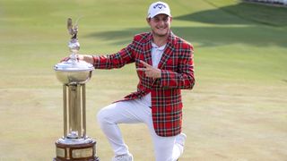 Emiliano Grillo with the Charles Schwab Challenge trophy