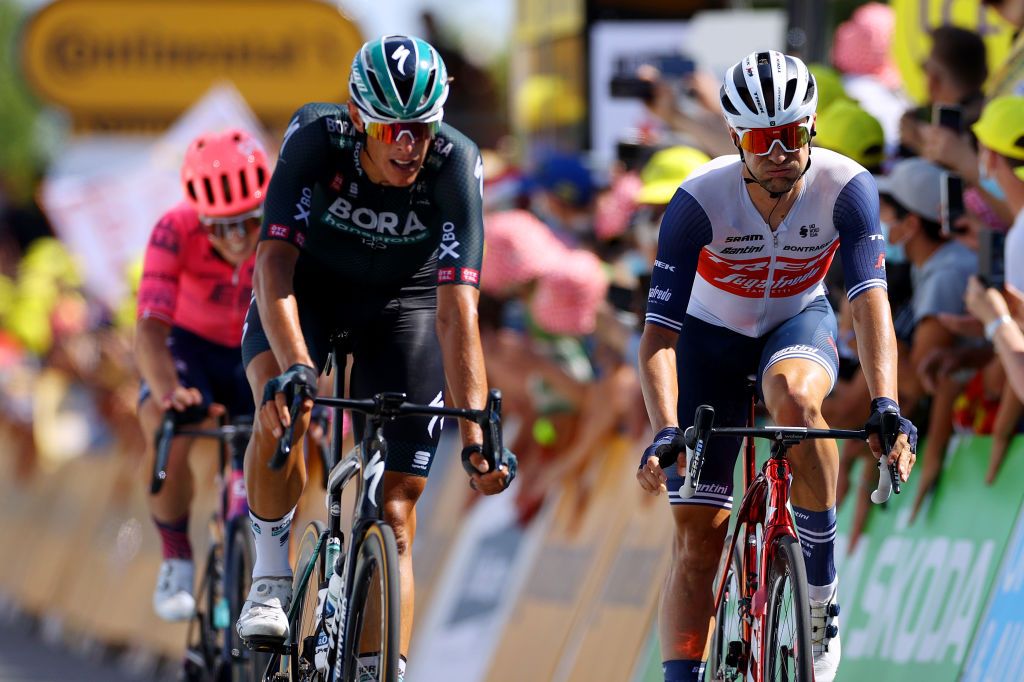 LIBOURNE FRANCE JULY 16 Nils Politt of Germany and Team BORA Hansgrohe Edward Theuns of Belgium and Team Trek Segafredo at arrival during the 108th Tour de France 2021 Stage 19 a 207km stage from Mourenx to Libourne LeTour TDF2021 on July 16 2021 in Libourne France Photo by Tim de WaeleGetty Images