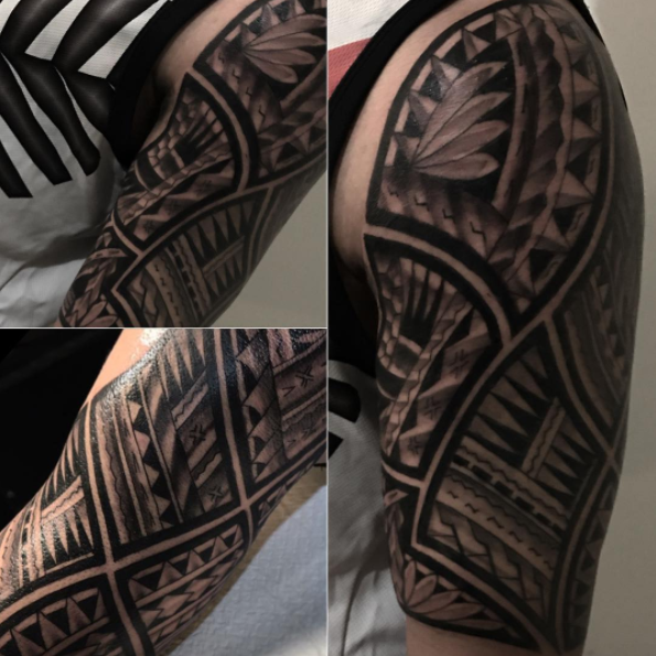 Thick framed tribal tattoo