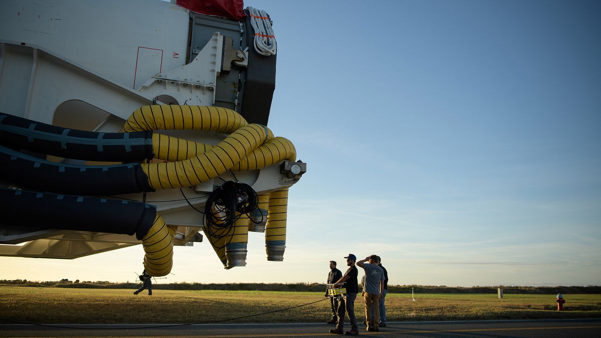 A Northrop Grumman Antares rocket is seen as it rolls out to Pad-0A, Tuesday, Oct. 29, 2019, at NASA's Wallops Flight Facility in Virginia.