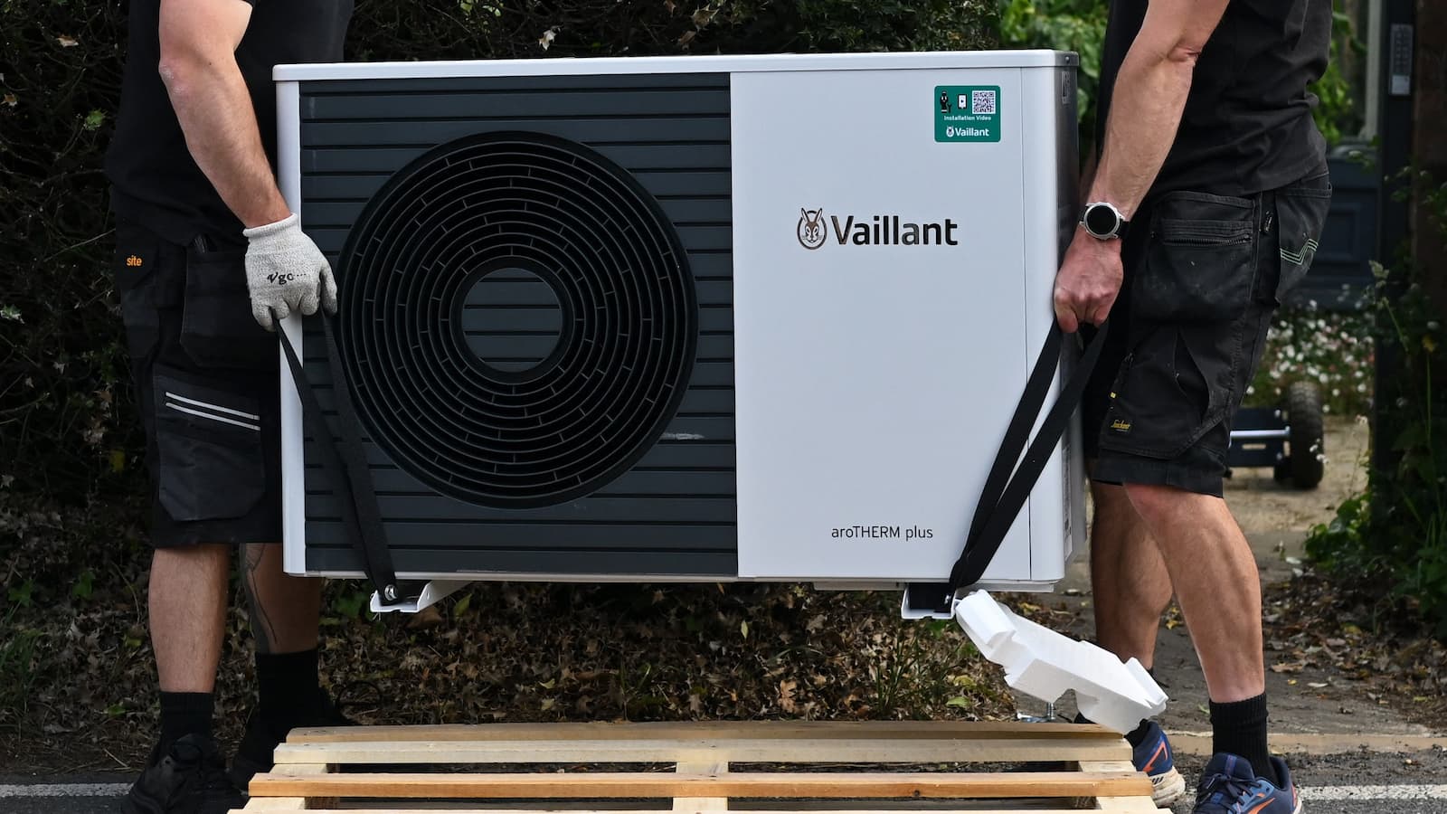 Heat pump installers for Vaillant installing a heat pump off a pallet