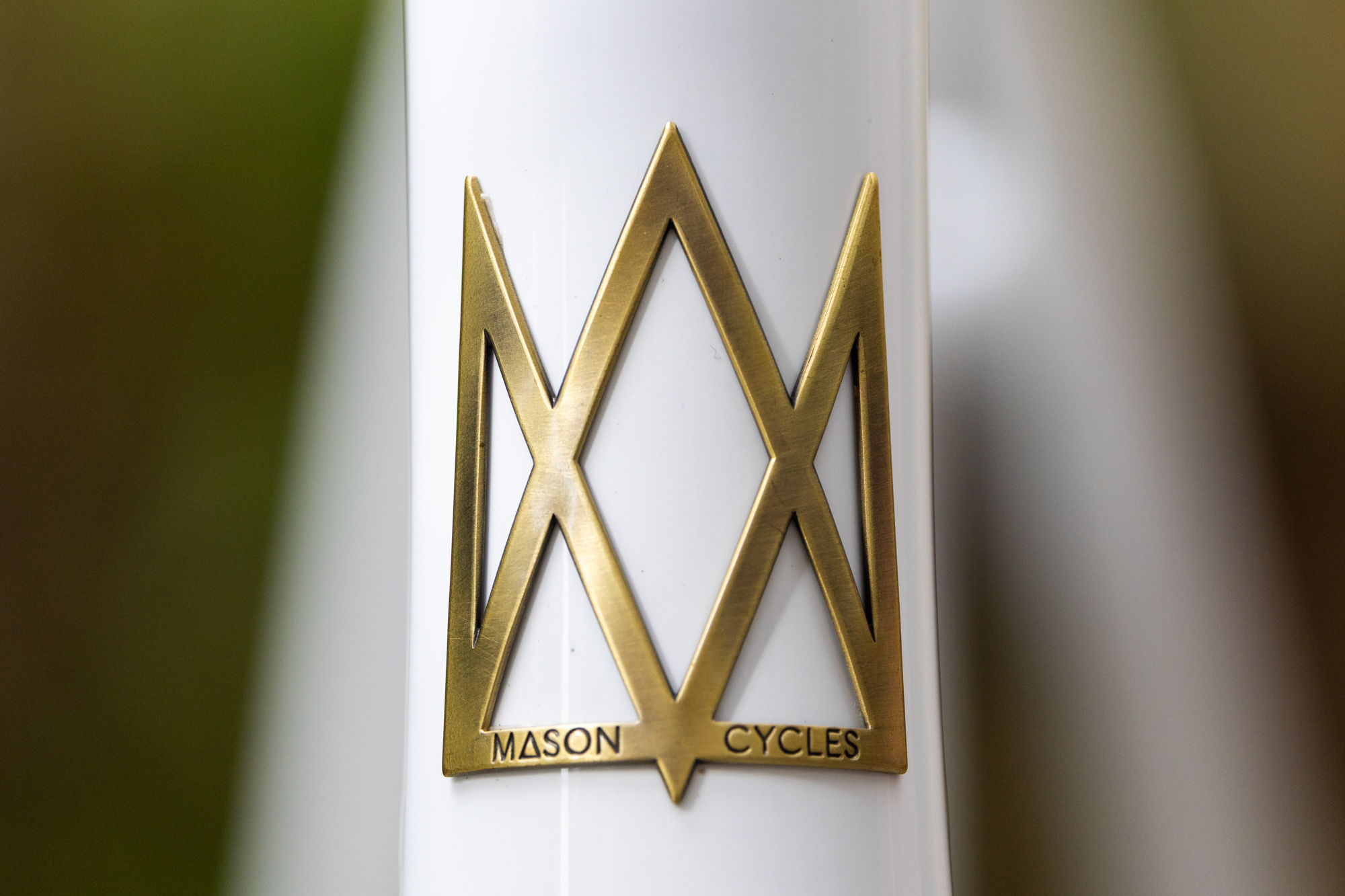 Close up of Mason's brass head tube badge