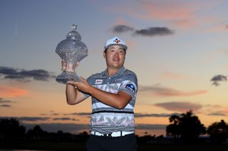 Sungjae Im holds the Honda Classic trophy