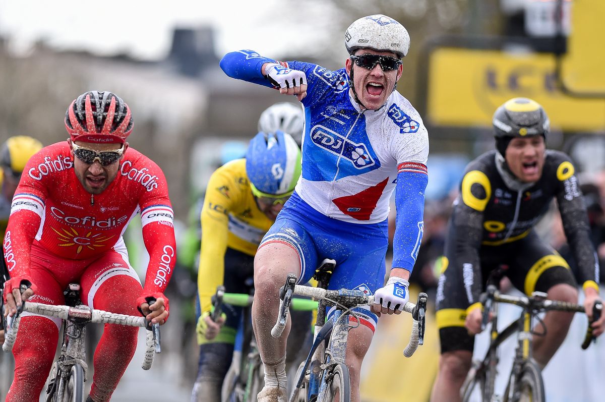A disappointed Nacer Bouhanni (Cofidis) can only watch on as Arnaud D&eacute;mare celebrates
