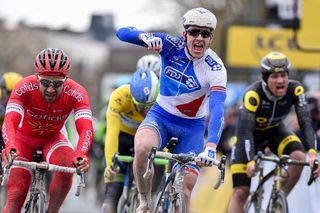 A disappointed Nacer Bouhanni (Cofidis) can only watch on as Arnaud Démare celebrates