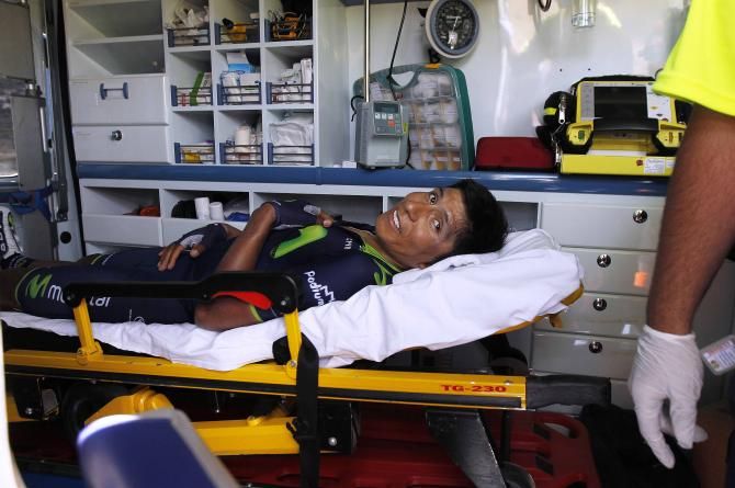 Nairo Quintana (Movistar) left the Vuelta in an ambulance, but smiling (thanks to pain killers, perhaps)