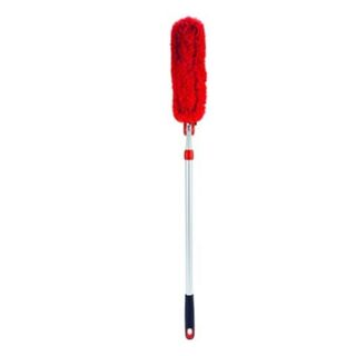 An Oxo good grips extendable duster with a red fluffy head