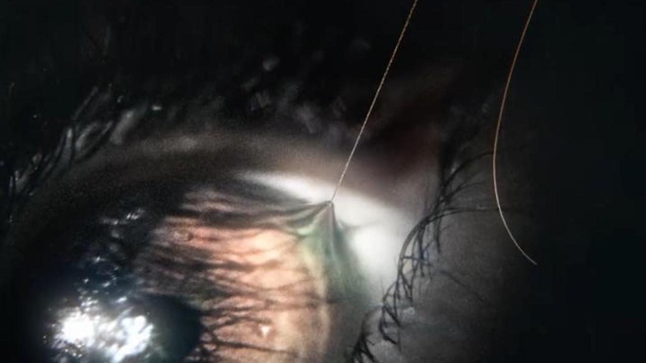 The Devil's Light poster, eye being pulled by a string