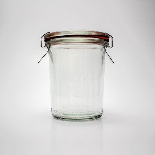 Small cylindrical jar with an orange seal and two metal clamps