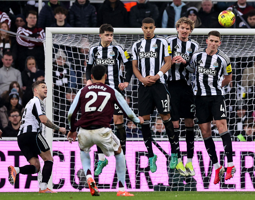 Aston Villa's Morgan Rogers takes a free kick against Newcastle