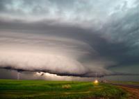 Tornado brewing over farmland