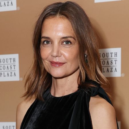 Katie Holmes wore a fringed little black dress with the peep-toe pumps trend