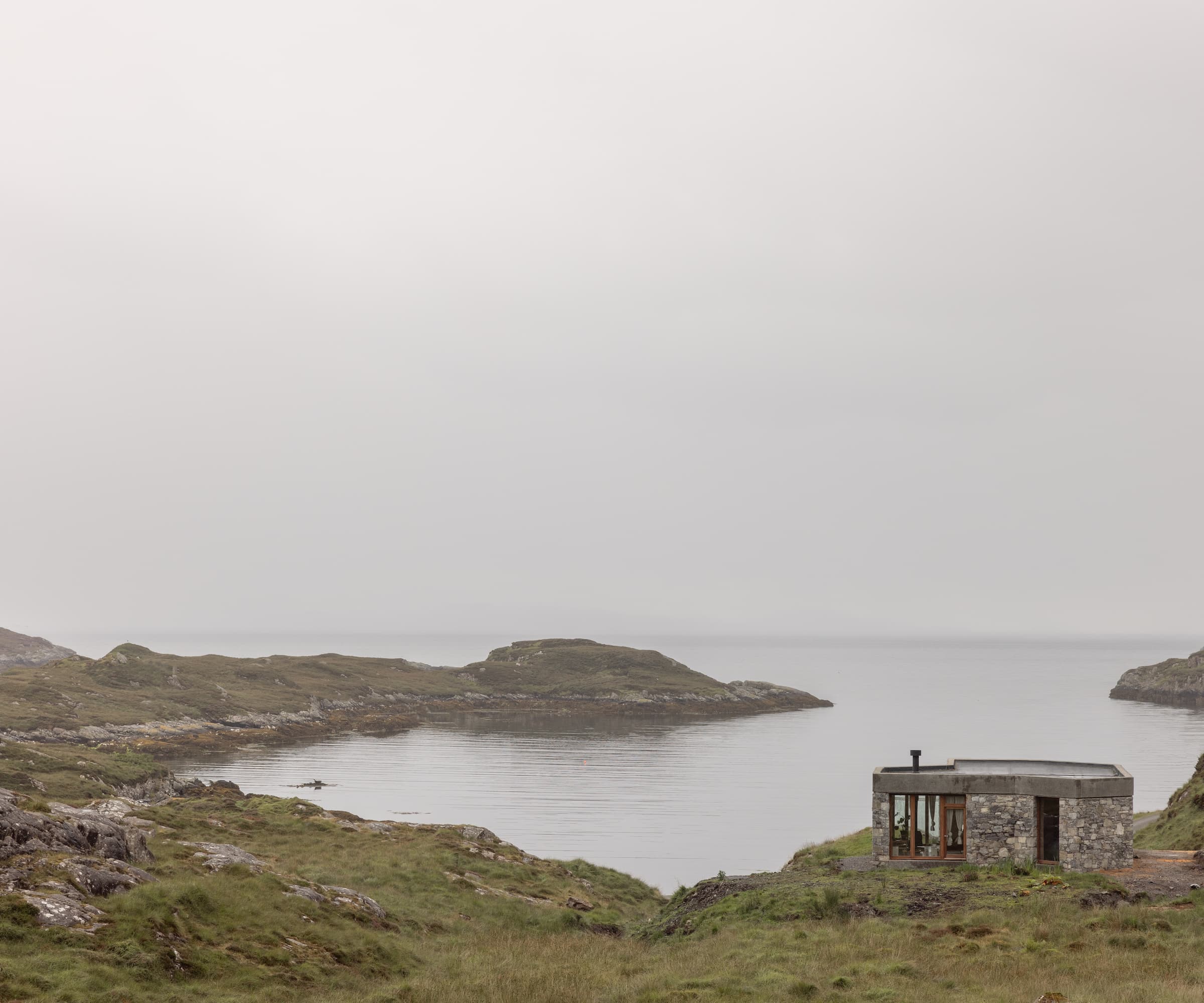 A stone self build on a cliff side