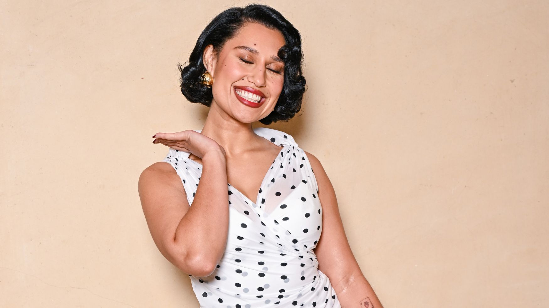 Raye wearing polka dot Jacquemus dress