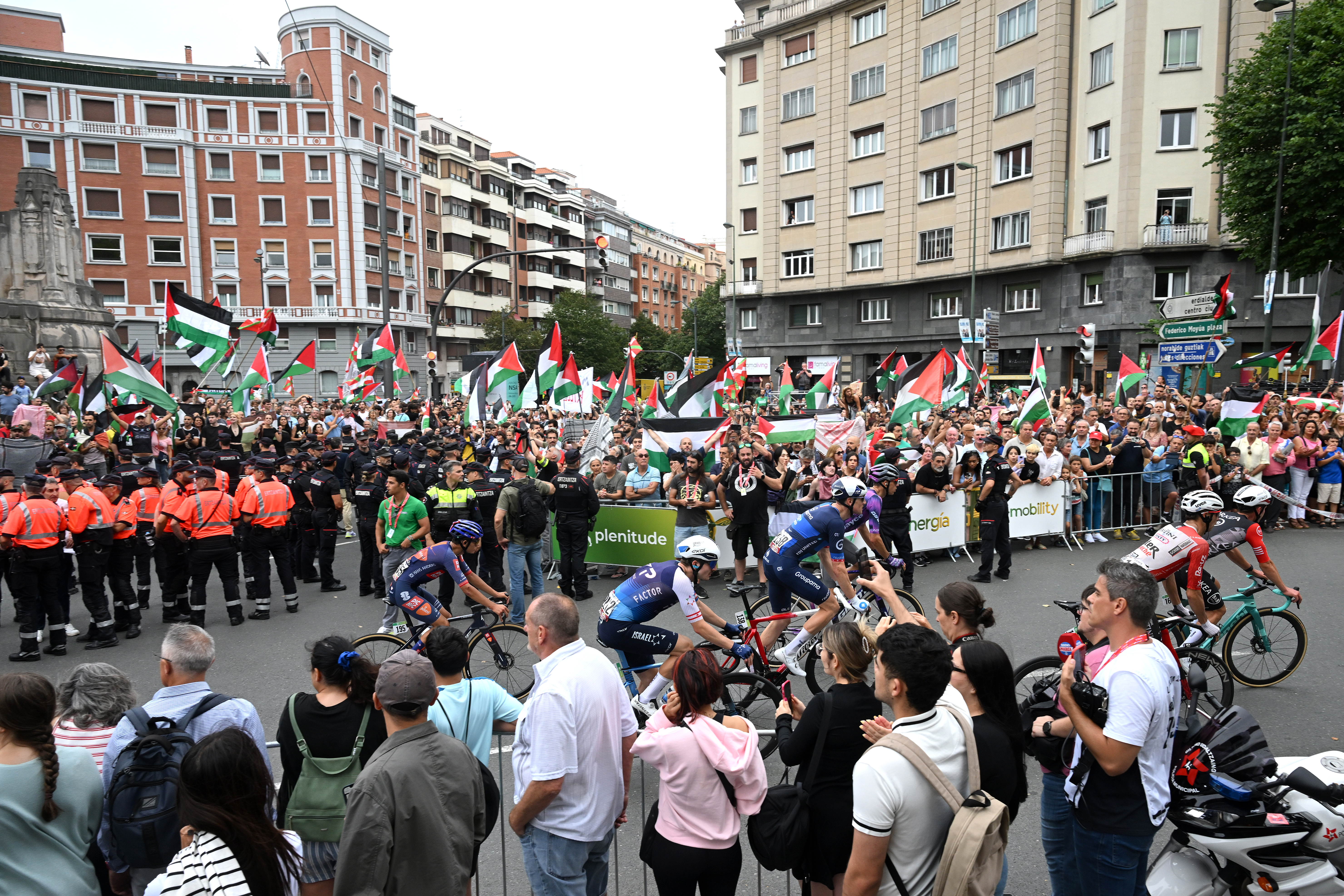 BILBAO, SPAIN - SEPTEMBER 03: Pro-Palestinian protesters after the La Vuelta - 80th Tour of Spain 2025, Stage 11 a 157.4km stage from Bilbao to Bilbao / Due to incidents at the finish line, the official times for the GC were taken at 3km from the finish line, there was no stage winner / #UCIWT / on September 03, 2025 in Bilbao, Spain. (Photo by Dario Belingheri/Getty Images)