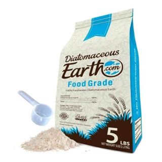 A large bag of diatomaceous earth with a clear plastic scoop