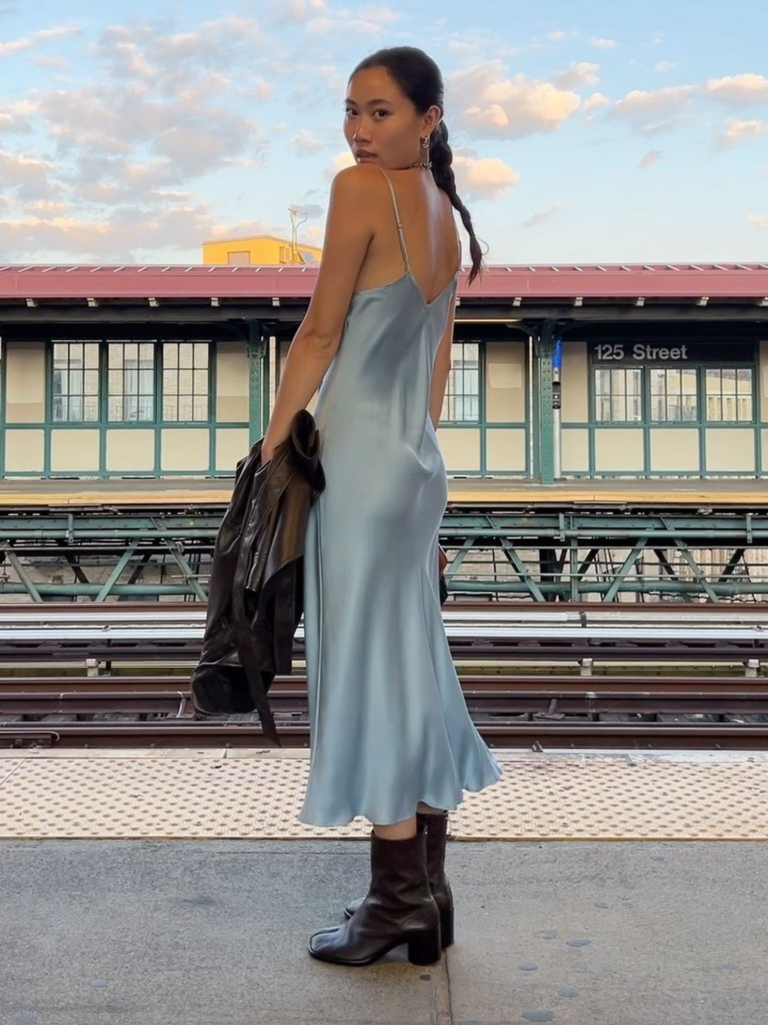 Influencer styles a pale blue dress.